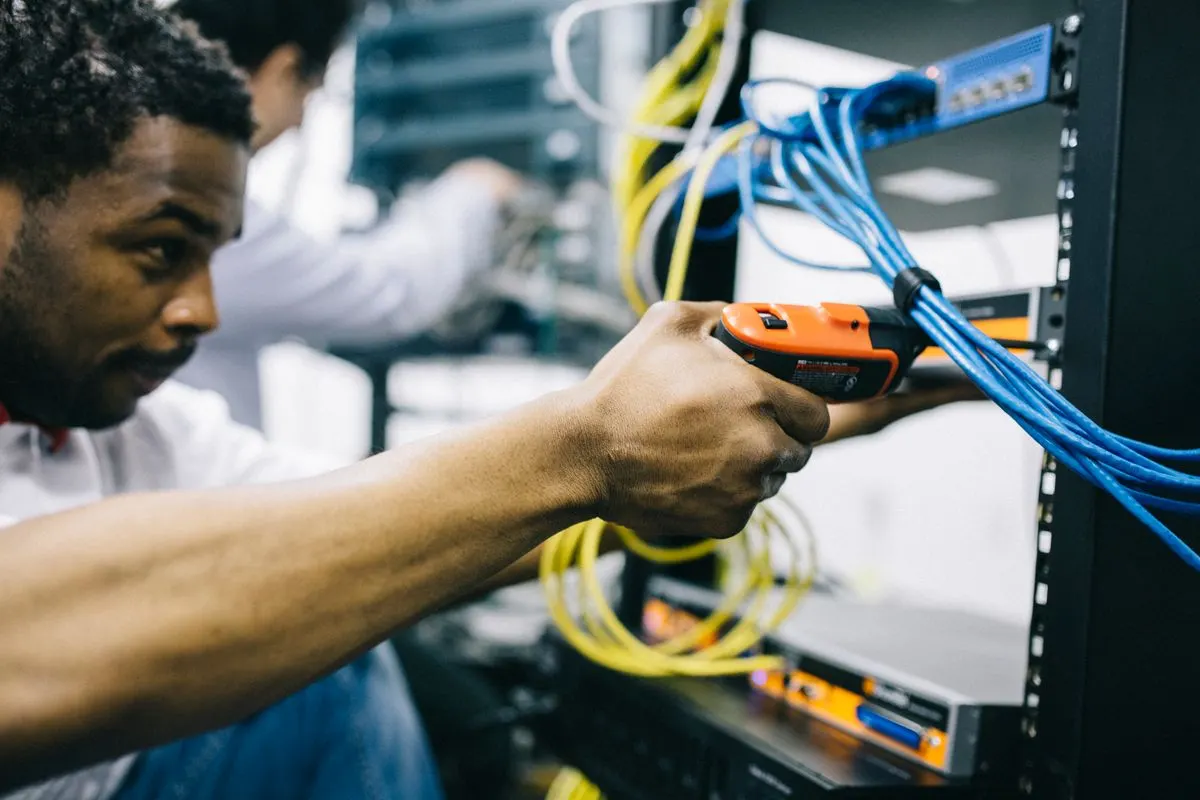 Sky Fast Telecom technician working on network installation